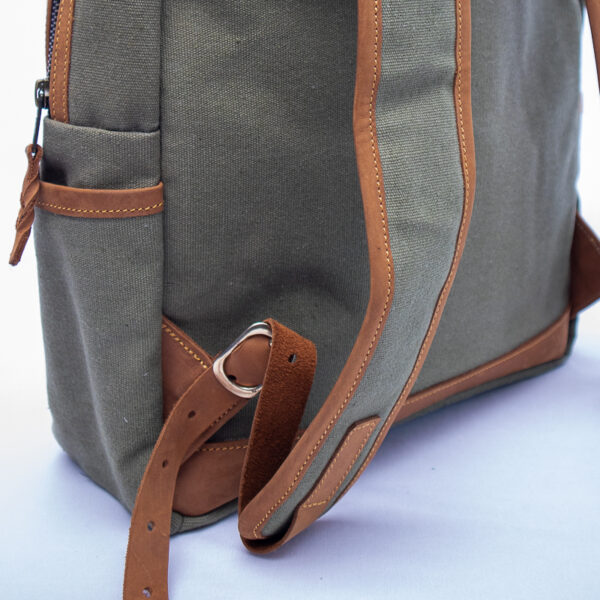Canvas texture on bag pack and leather in close view