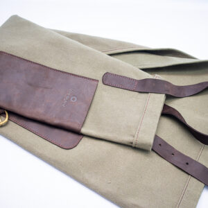 Large leather front pocket on canvas apron