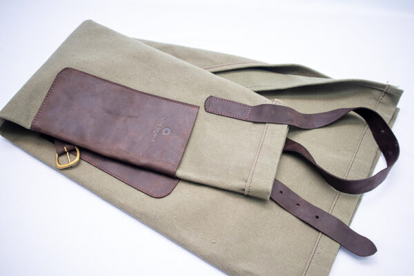 Large leather front pocket on canvas apron