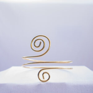 Bold and stylish adjustable arm cuff made from brass ,inspired by afrocentric heritage