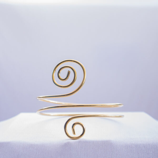 Bold and stylish adjustable arm cuff made from brass ,inspired by afrocentric heritage