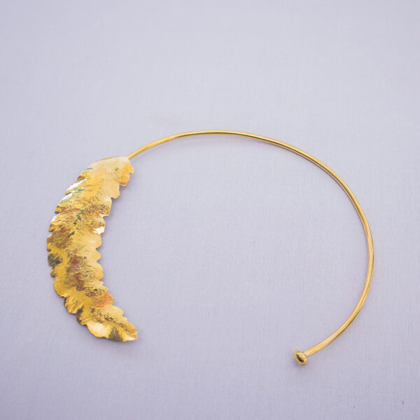 Rear view of the handcrafted feather detail statement choker. Made from pure brass with a shiny finish