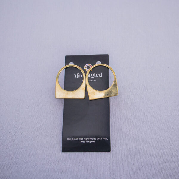 Polished brass earrings with a modern touch. Suitable for office wear.