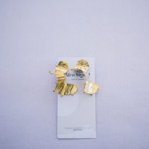 Afrostyled large brass drop earrings with hammered texture and afrocentric flair