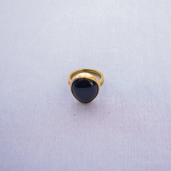 Recycled black glass on brass rings. Simple,unisex and stylish
