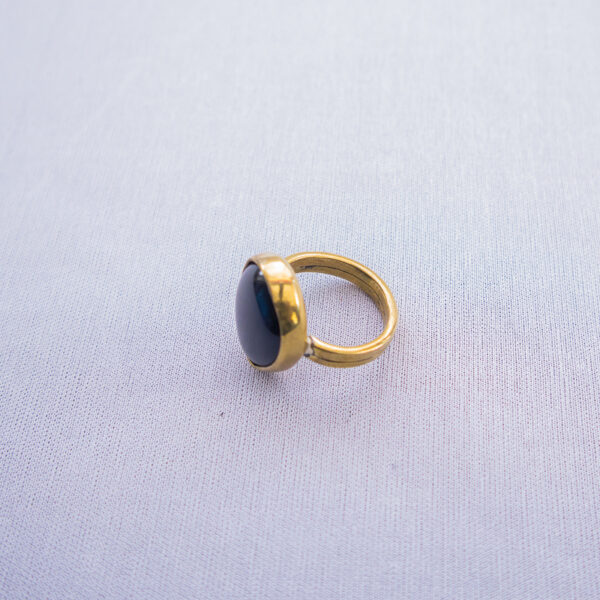 Recycled black glass on brass rings. Simple,unisex and stylish