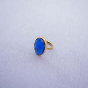 Ocean blue recycled glass on brass rings. Inspired by the blue sea and ocean water.