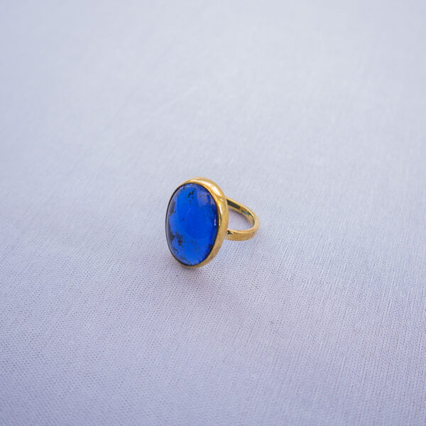 Ocean blue recycled glass on brass rings. Inspired by the blue sea and ocean water.