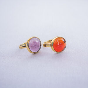 Glossy glass beaded ring with round glass beads and open band design. A combination of recycled glass and brass.