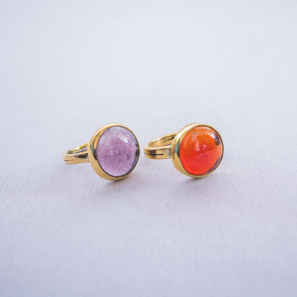 Glossy glass beaded ring with round glass beads and open band design. A combination of recycled glass and brass.