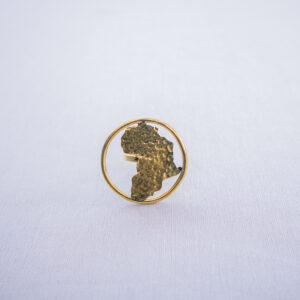 Brass statement ring featuring cutout Africa map design with a shiny finish