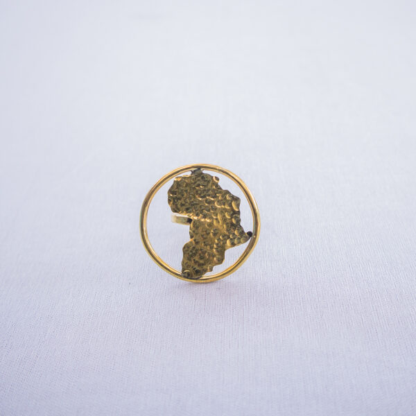 Brass statement ring featuring cutout Africa map design with a shiny finish