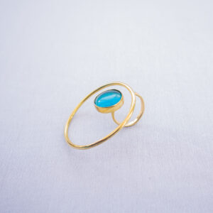 Handmade brass statement ring blended with recycled turquoise blue glass.