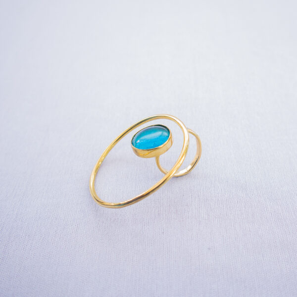 Handmade brass statement ring blended with recycled turquoise blue glass.