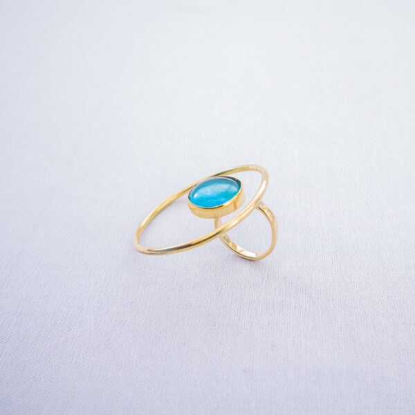 Handmade brass statement ring blended with recycled turquoise blue glass.