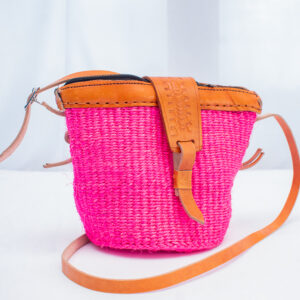 Small,pink sisal sling bag with leather strap,size 8. Handmade and perfect for carrying essentials with style.