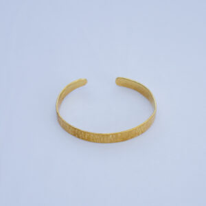 Handcrafted brass bracelet with a minimalistic design. Made from pure brass with a coarse finish.