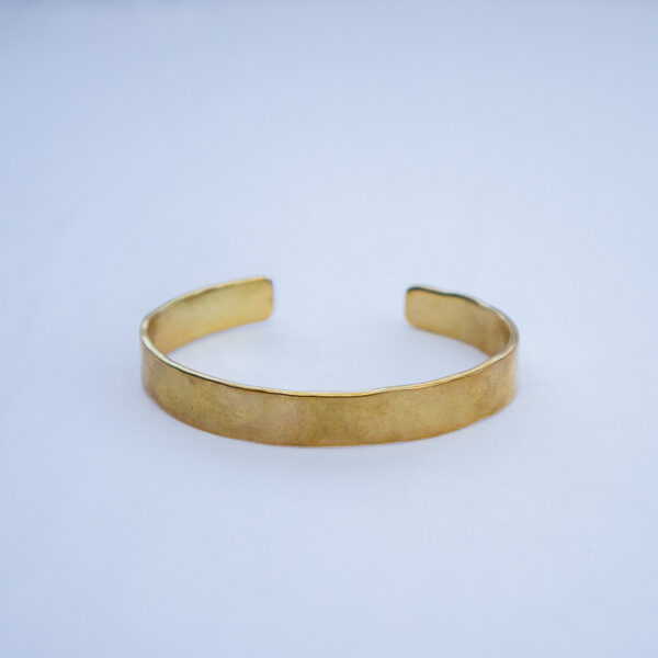 Simple handcrafted brass bracelet with a minimalistic design. Made from pure brass with a smooth finish.