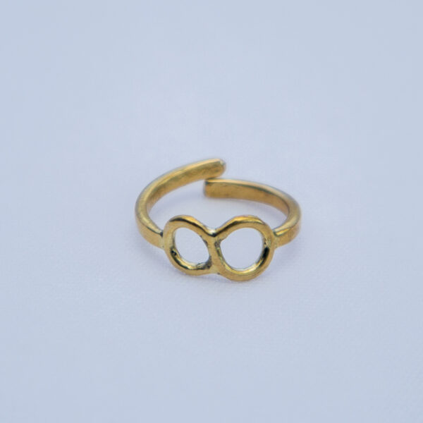 Simple adjustable brass ring with an infinity symbol.