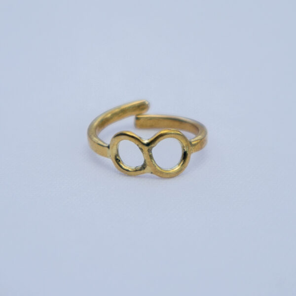 Simple adjustable brass ring with an infinity symbol.