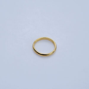 Classic brass wedding band with a smooth finish.