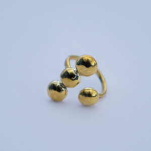 Open ended brass ring with subtle three dot design. Simple and adjustable.