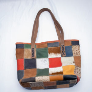 Colorful patchwork leather handbag for women. Stylish and unique .Made from recycled leather pieces.