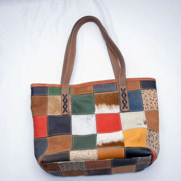 Colorful patchwork leather handbag for women. Stylish and unique .Made from recycled leather pieces.