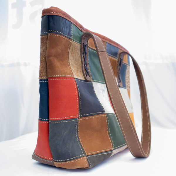 Colorful patchwork leather handbag for women. Stylish and unique .Made from recycled leather pieces.