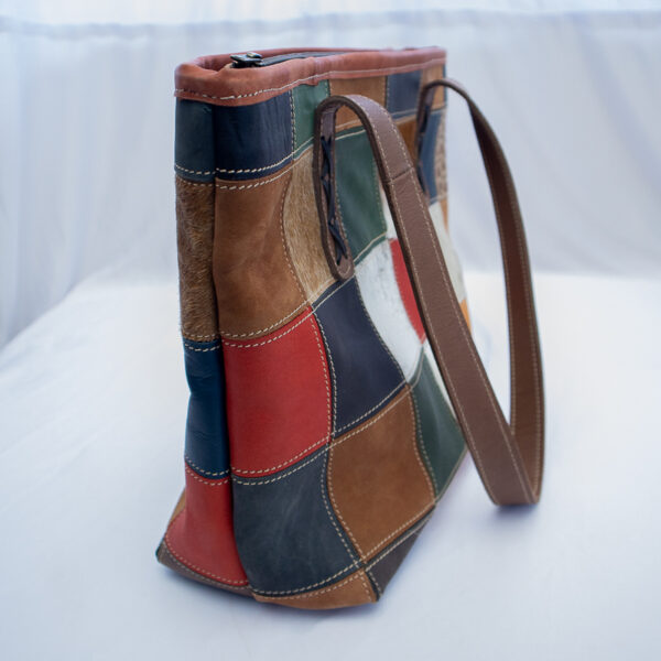 Colorful patchwork leather handbag for women. Stylish and unique .Made from recycled leather pieces.