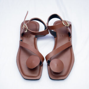 Brown leather flat sandals for women. They are comfortable,stylish with adjustable straps.