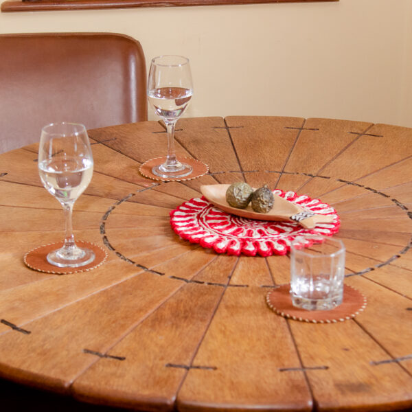 Eco-friendly sisal coasters crafted and painted by hand.
