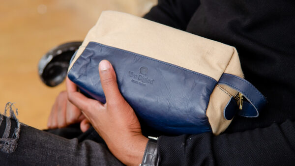 Stylish canvas and leather washbag. Made in Kenya.