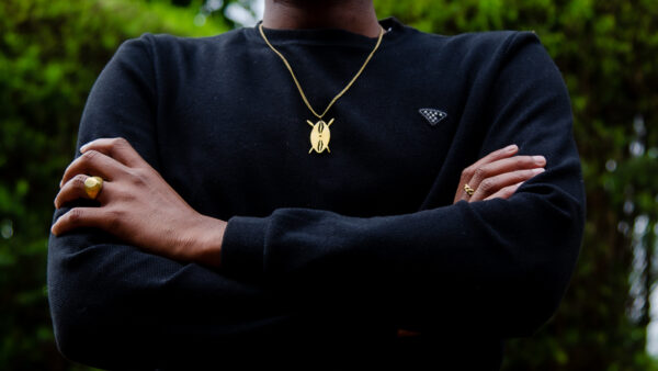 Brass pendant inspired by the iconic Kenyan shield. It reflects Kenya's identity and tradition.