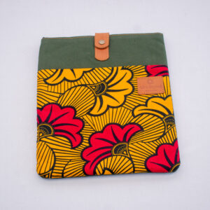 Handmade green canvas laptop sleeve with kitenge fabric accents, durable African tech accessory.