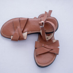 Brown ladies’ sandals made from genuine leather with simple handmade strap and a grip sole to last longer.