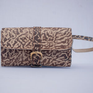 Handcrafted ladies leather purse in beige and chocolate brown with side handle, front button closure, buckle and interior zip with card slots