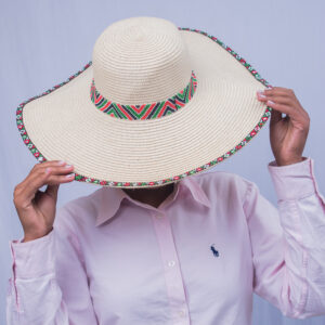 Handcrafted AfroStyled fedora hat featuring intricate beadwork in Kenyan flag colors - black, red, green and white - symbolizing culture and pride.