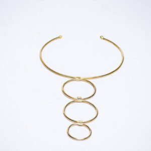 Statement brass choker with three graduated circular loops in a linear arrangement.