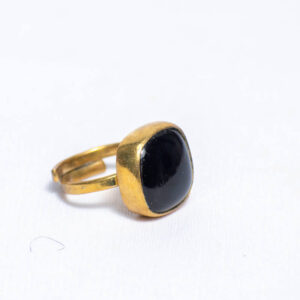 Handmade black recycled glass beaded ring with brass accents for a bold look.