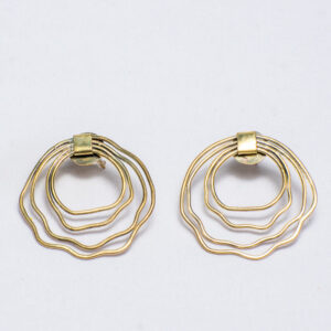 Layered circular brass earrings with organic wavy rings and a polished finish.