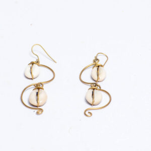 Handcrafted brass earrings featuring natural cowrie shells and sculptural wire design.