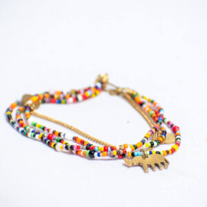 Handmade anklet made of multicolored beads.Has a brass accent and a brass charm