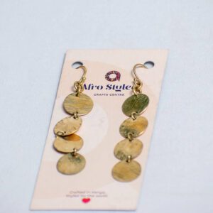 Handmade brass drop earrings with layered circular discs and hooks closure.
