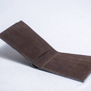 Elegant suede brown leather wallet handcrafted in Africa, featuring a sleek minimalist design and premium craftsmanship.