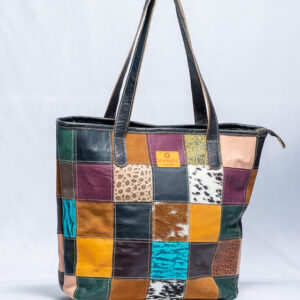 Patchwork leather tote bag with multicolored leather panels and sturdy shoulder straps.Has compartments and a zip on the inside.