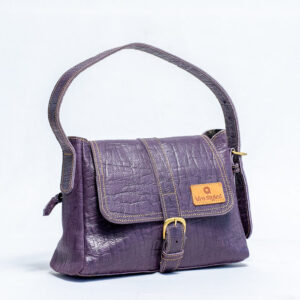 Dark purple leather shoulder bag with flap closure,buckle detail,and single shoulder strap.Has a zip on the back side.