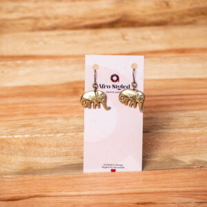 A pair of handcrafted golden brass drop earrings shaped like miniature elephants with a slightly textured, reflective finish.
